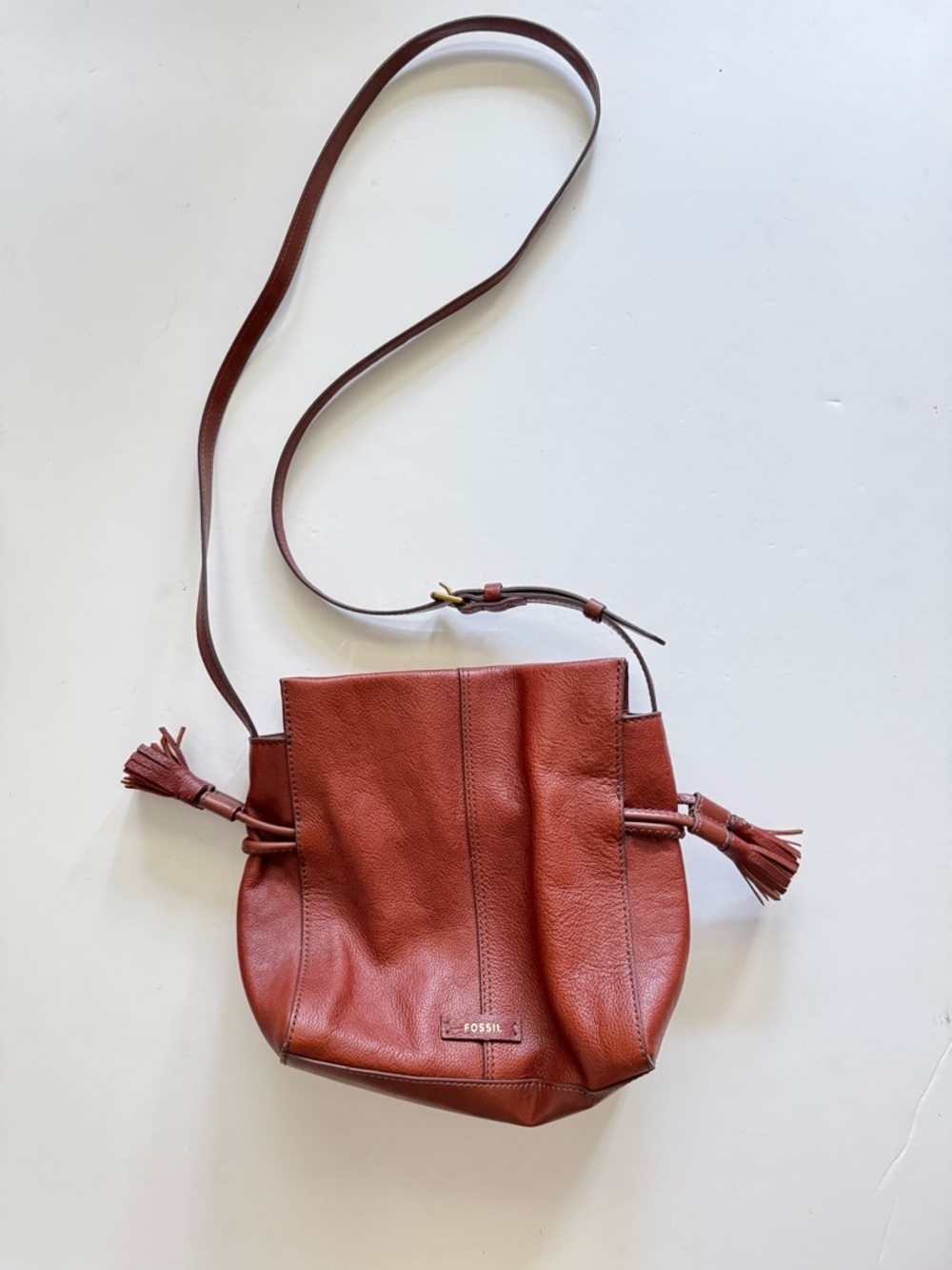 Fossil Women's  Rayna Drawstring Tassel Cognac Leather Crossbody Bucket Bag